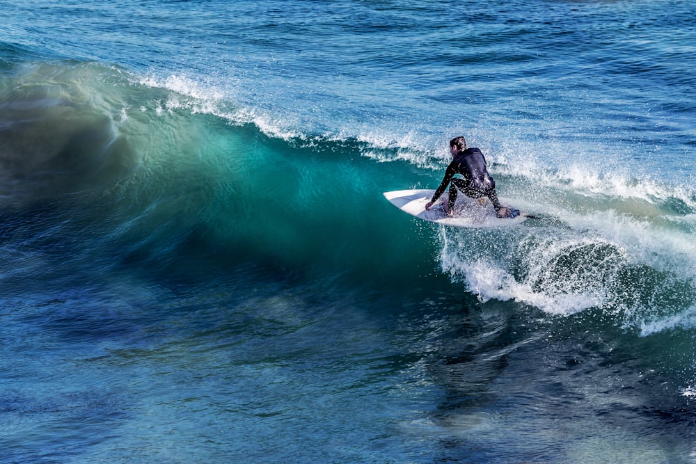 Surfer riding a wave in Bali
